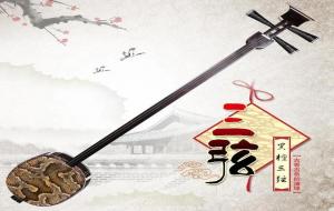 三弦乐器（三弦是哪个民族的乐器）